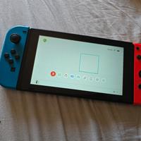 Nintendo switch seminuova con caricabbaterie e joy