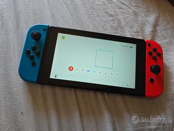 Nintendo switch seminuova con caricabbaterie e joy