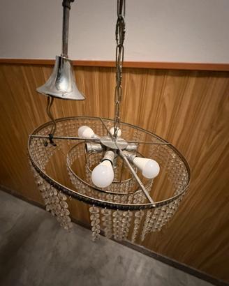 Lampadario in cristallo e ottone