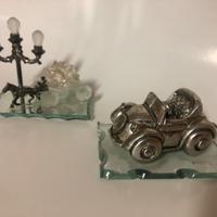 Sculture vintage in vetro e metallo