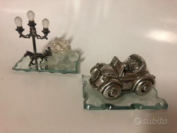 Sculture vintage in vetro e metallo