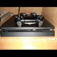 Playstation 4 con manopole e giochi