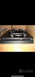 Playstation 4 con manopole e giochi