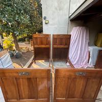 Letto in legno masello con decirazioni intagliate