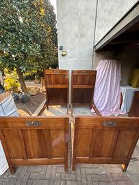 Letto in legno masello con decirazioni intagliate