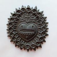 Medaglione Caritas in metallo