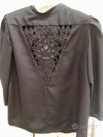 Giacca cucita e ricamata artigianalmente 