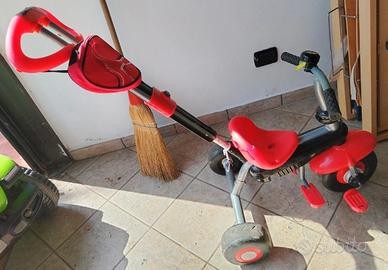 Triciclo con manico ed accessori