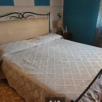 Letto matrimoniale con die materassi singoli