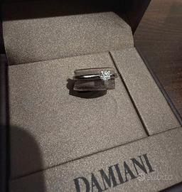 Anello solitario Damiani oro bianco e diamante