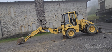 Terna 65ql Komatsu WB70A targa+forche braccio tele