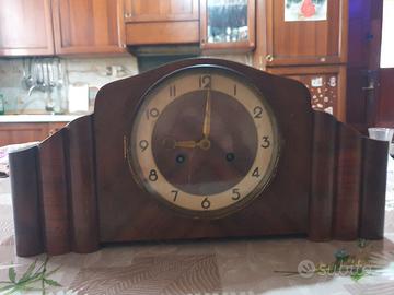 Orologio antico da camino a pendolo