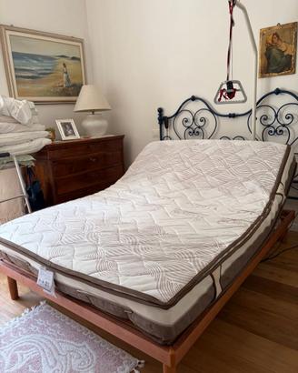 Letto matrimoniale con rete motorizzata
