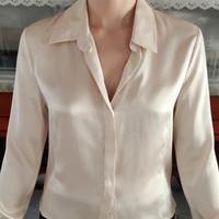 Camicia beige.