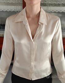 Camicia beige.