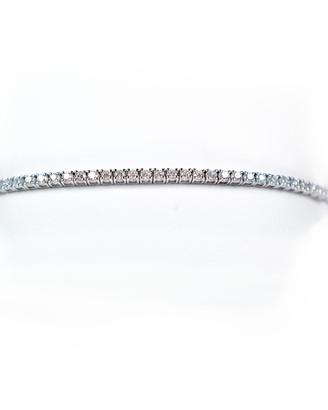 Tennis in oro con diamanti