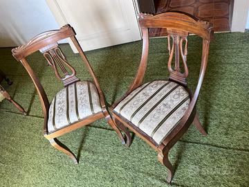 Coppia di sedie vintage con schienale a lira