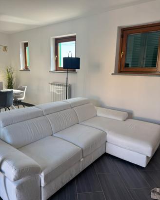 DIVANO A L con parte piedi estraibile