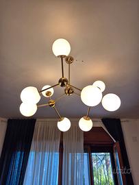Lampadario moderno a sospensione "Atomo" in ottone