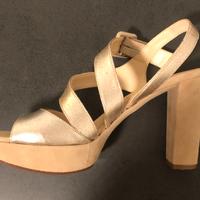 Marca: Unisa. Accessorio: Sandali Donna Dorati