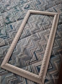 cornice portaspecchio