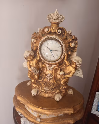 orologio più candelabro in gesso 