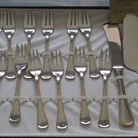 Set dolce 14 pezzi in acciaio inox e decoro in oro