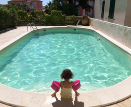 B.locale in villa con piscina privata