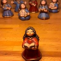 Thun angelo ceramica rosso con libro