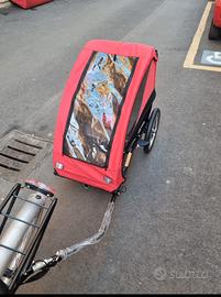 Rimorchio bimbi per bici