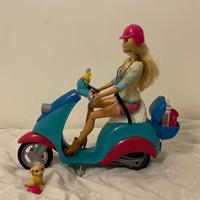 Barbie con scooter