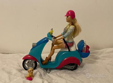 Barbie con scooter