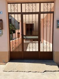 Appartamento con doppio giardino e posto auto