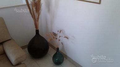 Boccioni da vino vintage e portabottiglie