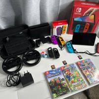Nintendo Switch OLED con giochi e accessori
