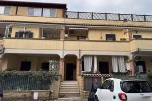 Appartamento e posto auto in asta a Fiumicino RM