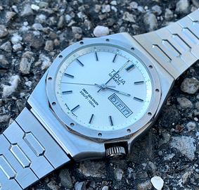 Orologio TIQUA (Texas Instrument QUArz)