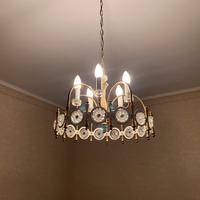 Lampadario a sospensione e appliques coordinate