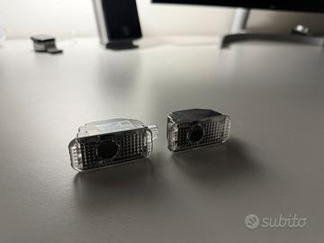 Luci cortesia / sotto porta Audi con logo