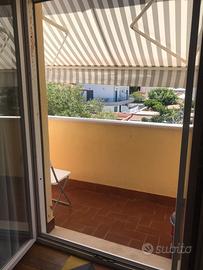 Camera con bagno ed angolo cottura