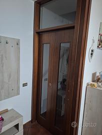 Porta a Libro 