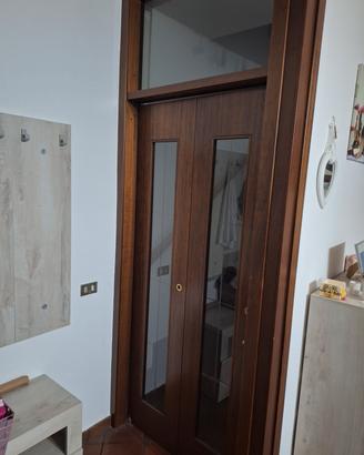 Porta a Libro 