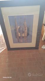 quadro con cornice in legno e disegni particolari