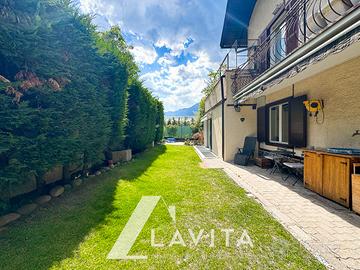 Quadrilocale con giardino e taverna a Ora