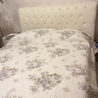 Letto con cintenitote in ecopelle