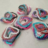 N. 6 confezioni di Bracciali perline plastica