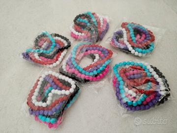 N. 6 confezioni di Bracciali perline plastica