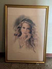 Quadro (stampa) con cornice dorata.