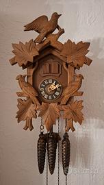 Orologio a cucu con 3 pesi