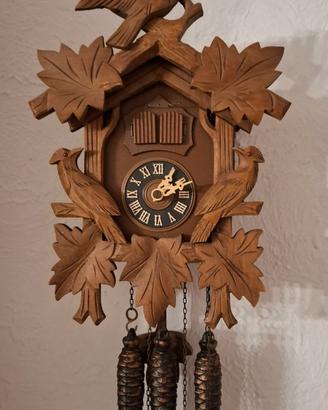 Orologio a cucu con 3 pesi